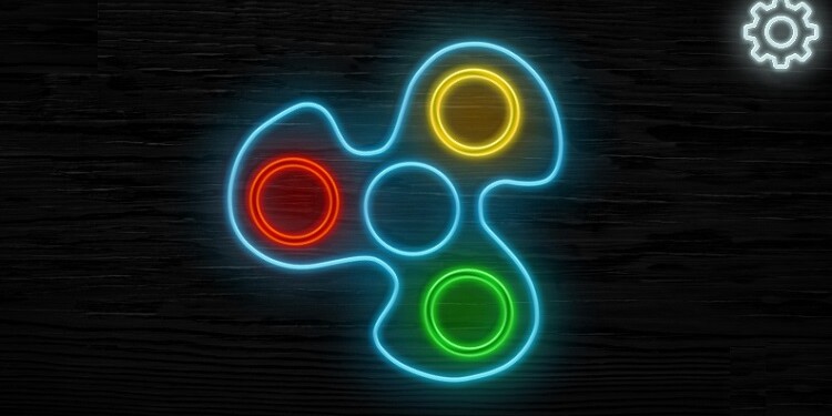 Игра неоновым спиннером Игра неоновым спиннером